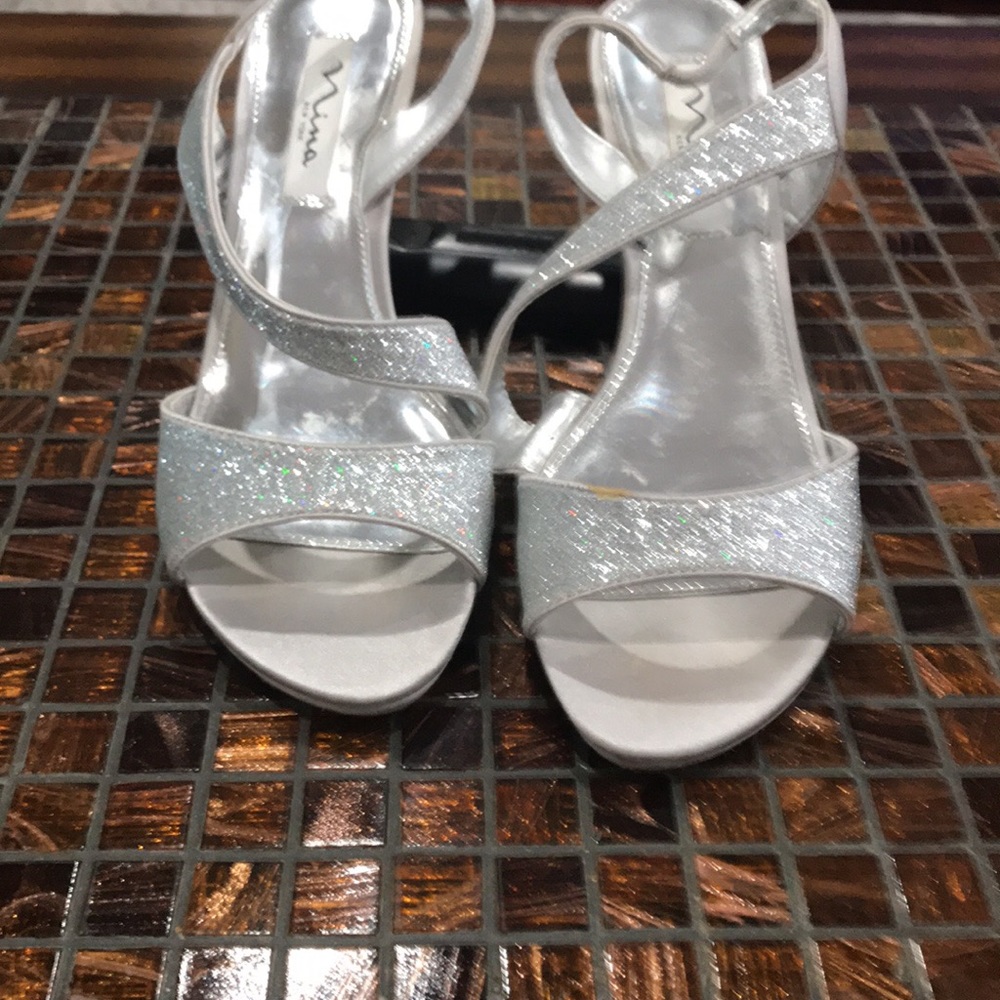 Fancy silver sandals